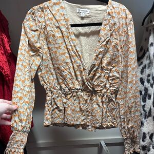 Long sleeve Versona blouse. Perfect for date nights in the fall.